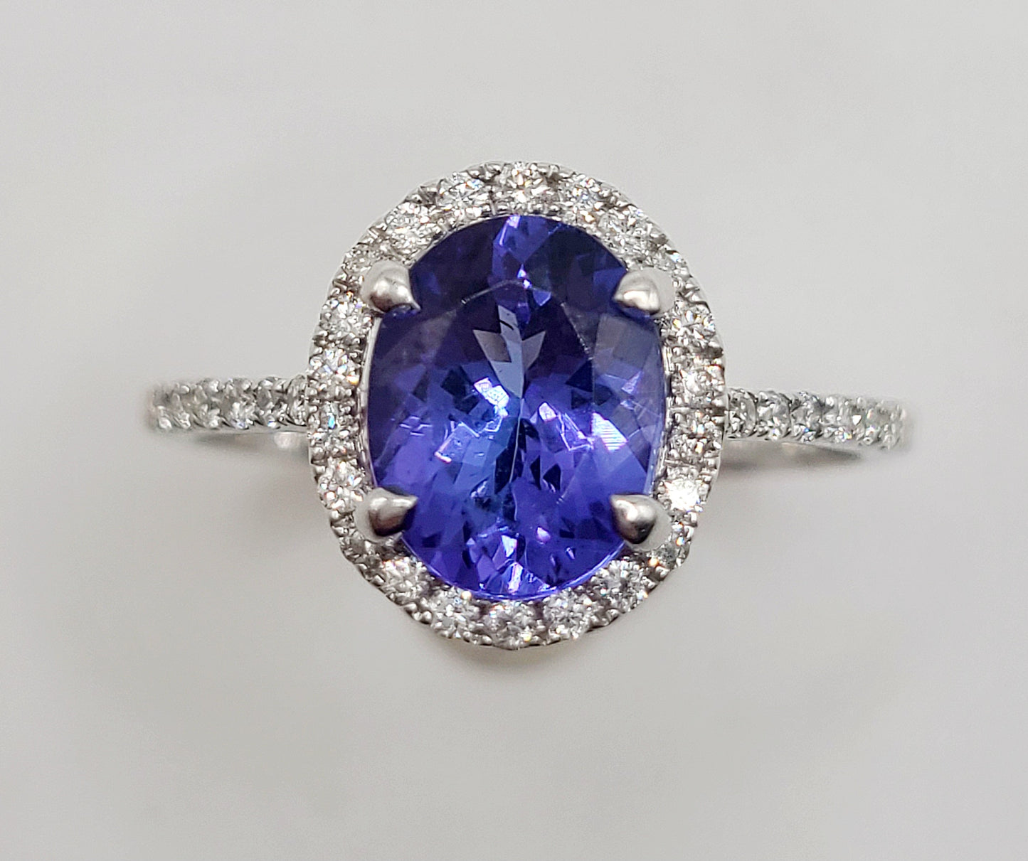 Tanzanite 1.5ct Solitaire with Diamond Halo & Shoulders 18ct White Gold Ring (P)