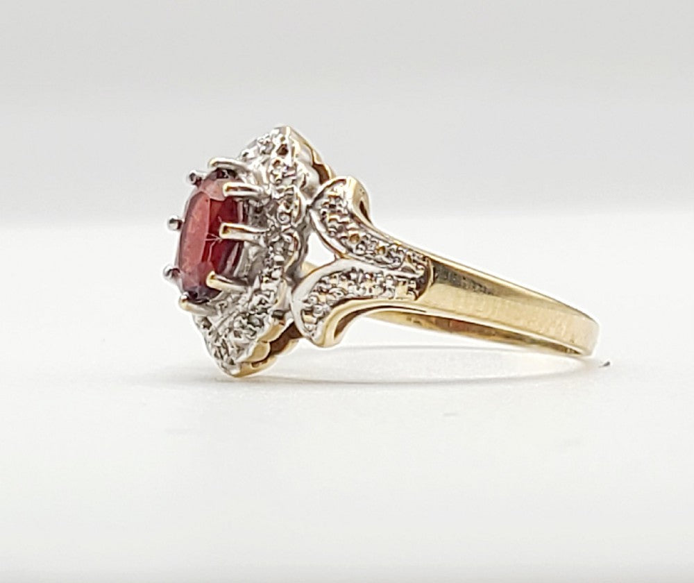 Oval Cut Garnet with Diamond Suround & shoulders 9ct Gold Ring (P1/2)