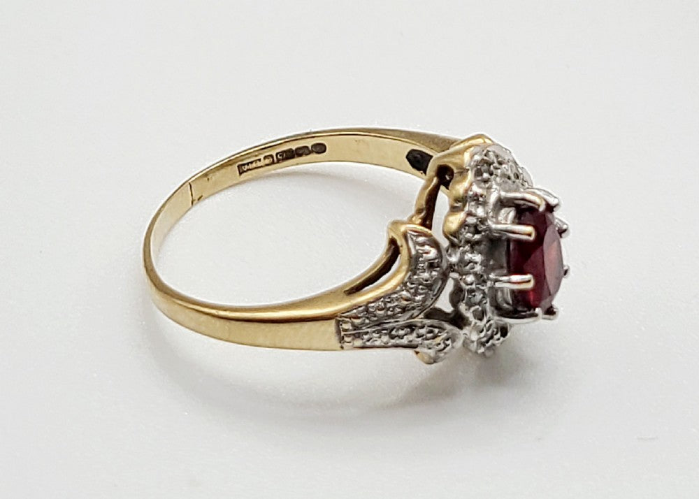 Oval Cut Garnet with Diamond Suround & shoulders 9ct Gold Ring (P1/2)