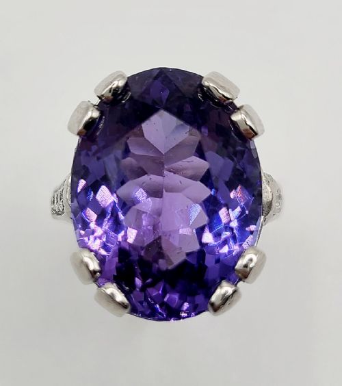 Tanzanite & Diamond Solitaire 18ct Gold Ring
