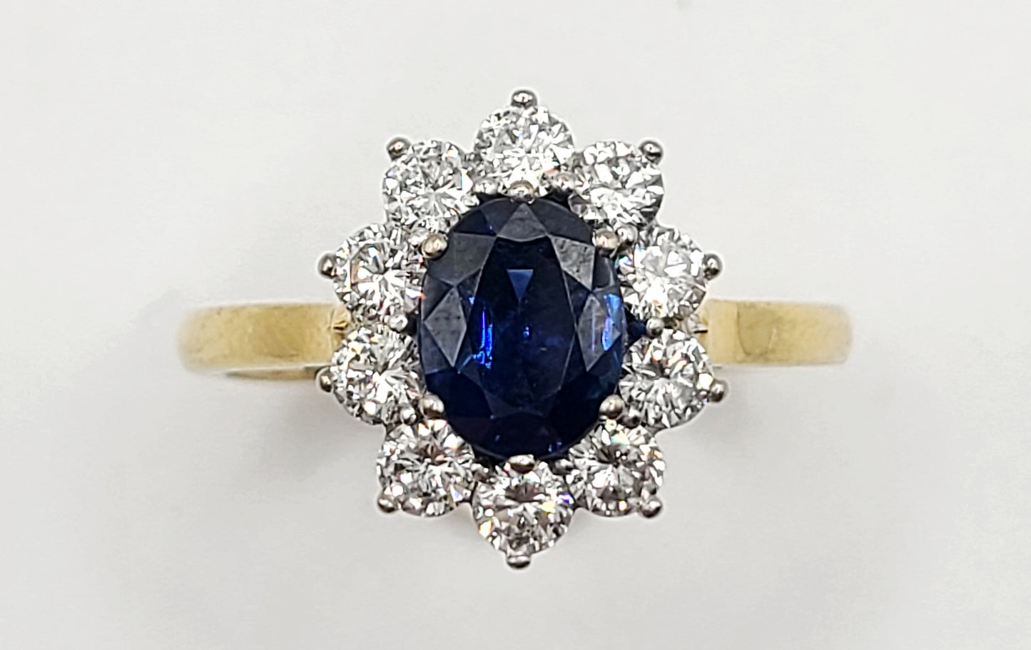 Sapphire and VS 0.75ct Diamond 18ct Gold Cluster Ring (Q)