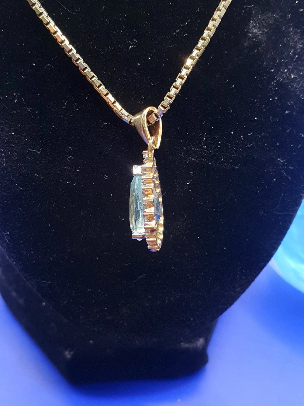Pear Cut Blue Topaz With Diamond Halo on 9ct Gold Pendant